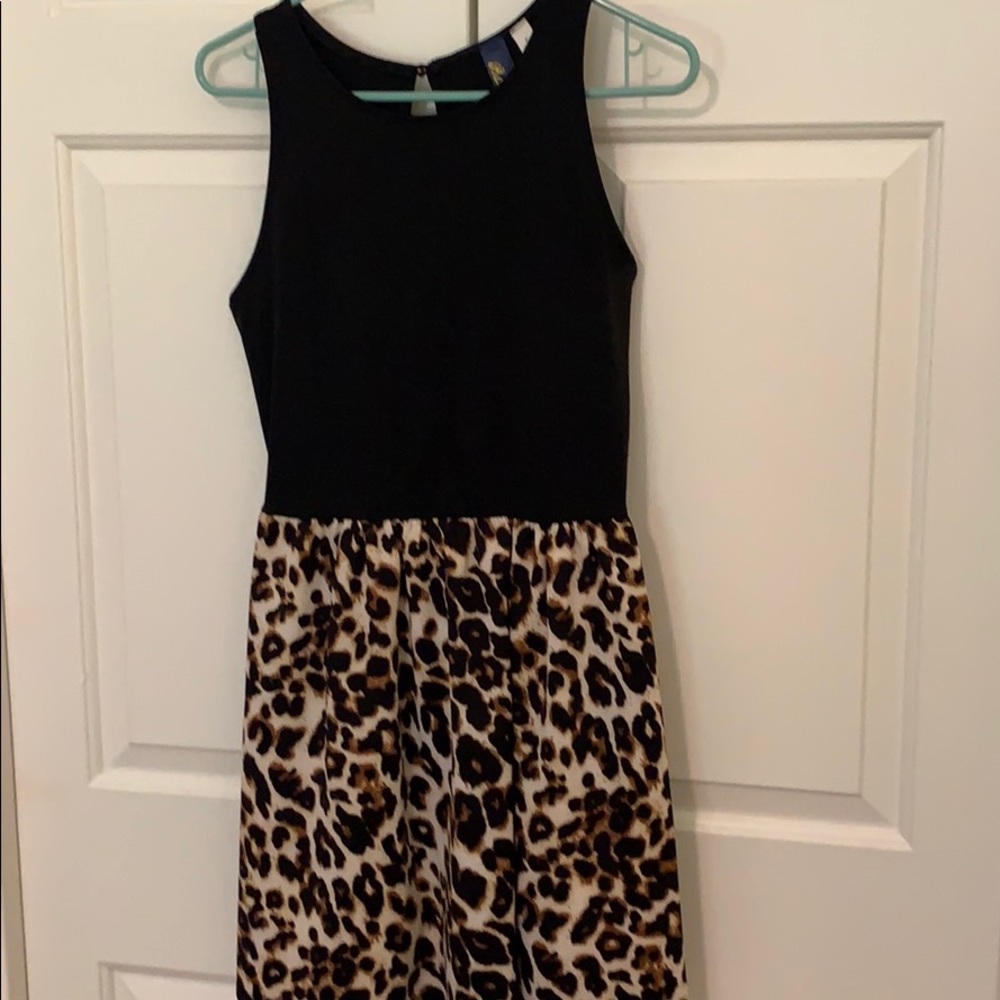 Sleeveless Dress with black top and leopard skirt